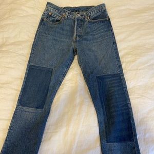 Levi boyfriend jeans with patches. Size 28. Never worn
